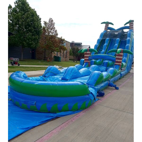 Tropical Slide Set Up Parking Lot With Blocks Sandbags