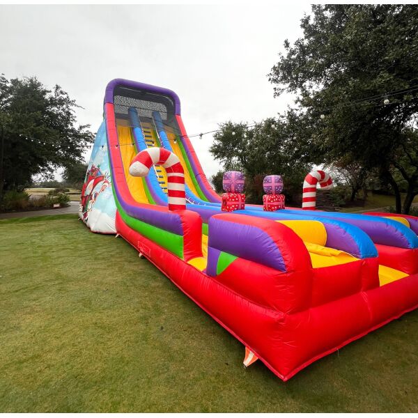 Christmas Slide Set Up Grass With Stakes FRONT VIEW