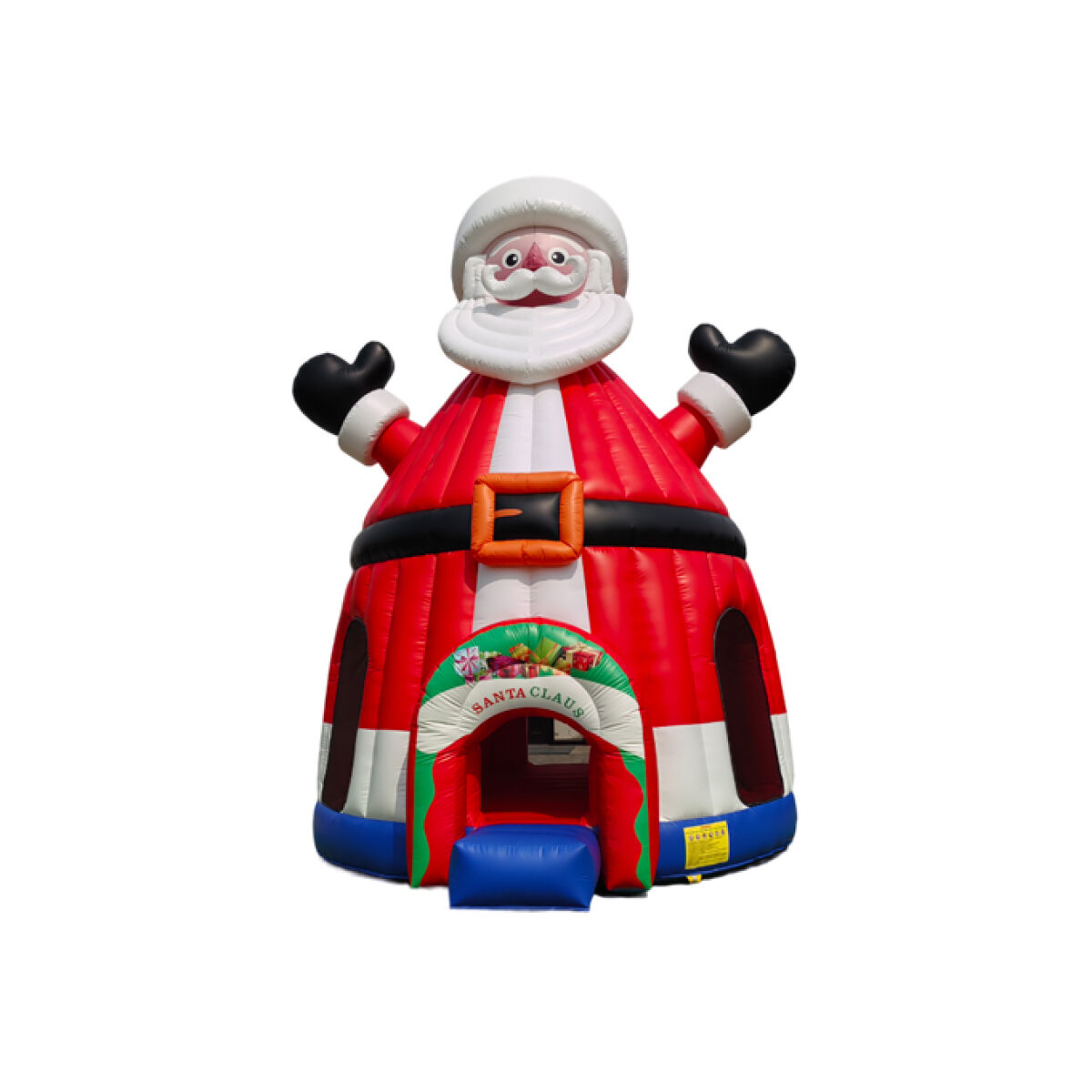 A large inflatable structure designed to look like Santa Claus. Santa has his arms raised joyfully, wearing a red suit with black belt and white trim. The structure features a decorative entrance that says "Santa Claus" and is adorned with festive decorations. The base is blue, emphasizing its joyful holiday theme.